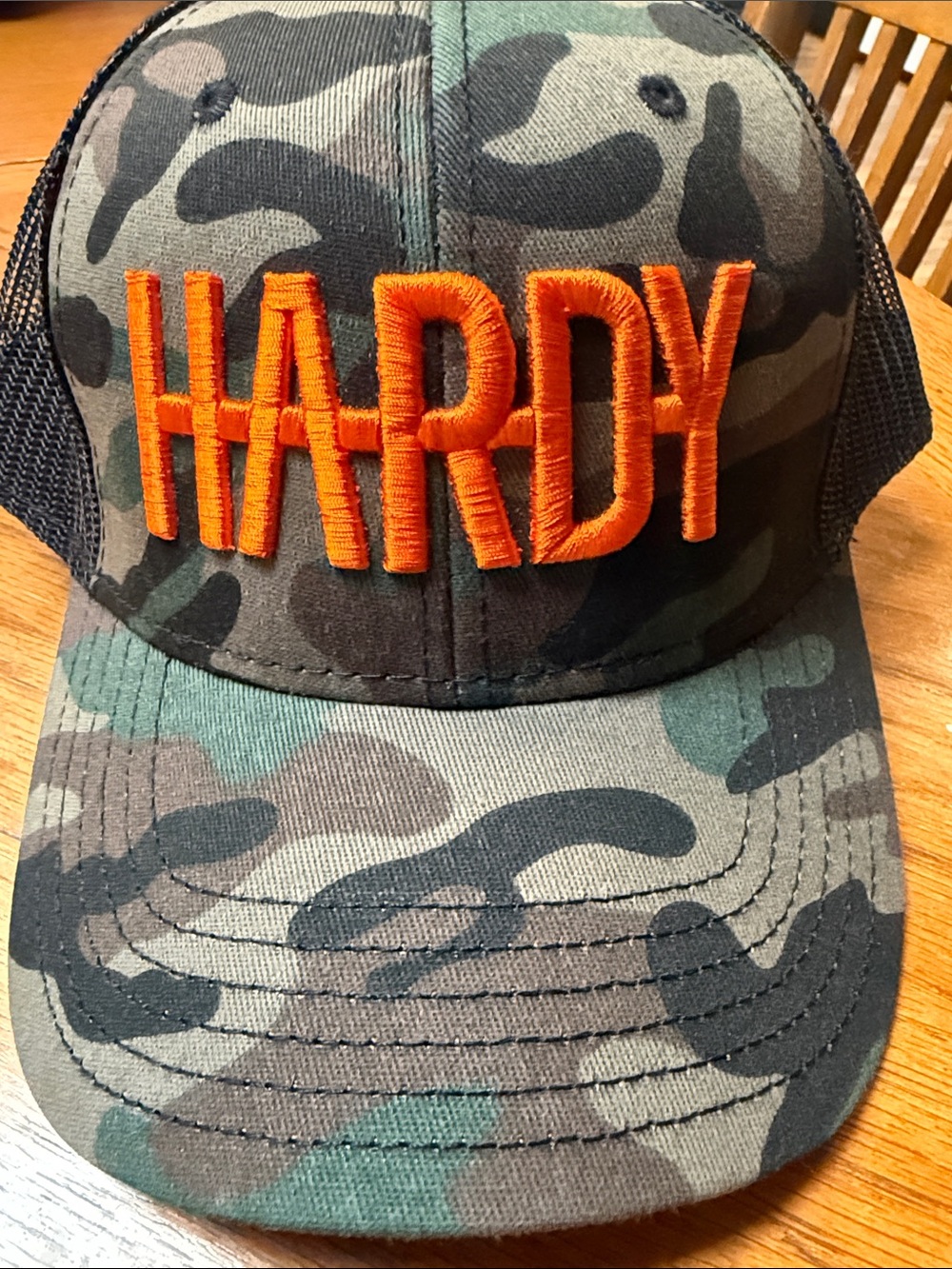 OTTO Camo Trucker Hat with Orange "HARDY" Embroidery